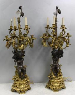 Appraisal: Large and Impressive Pair of Dore Bronze Candlebra with Putti