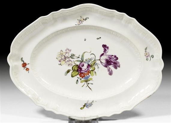 Appraisal: OVAL PLATTER WITH FLORAL PAINTING IN THE STYLE OF THE