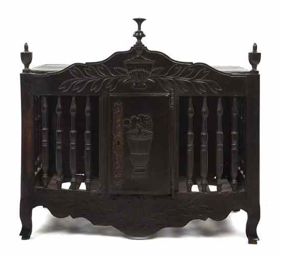 Appraisal: A French Provincial Panetiere of typical form the arched crest