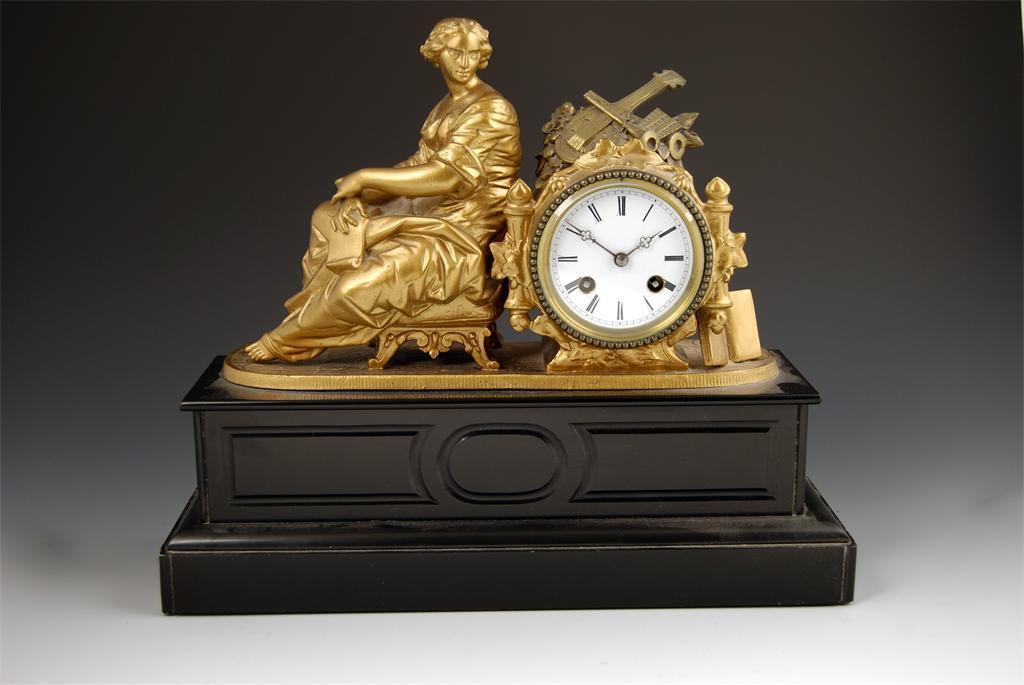 Appraisal: A French gilt spelter and marble mantel clock