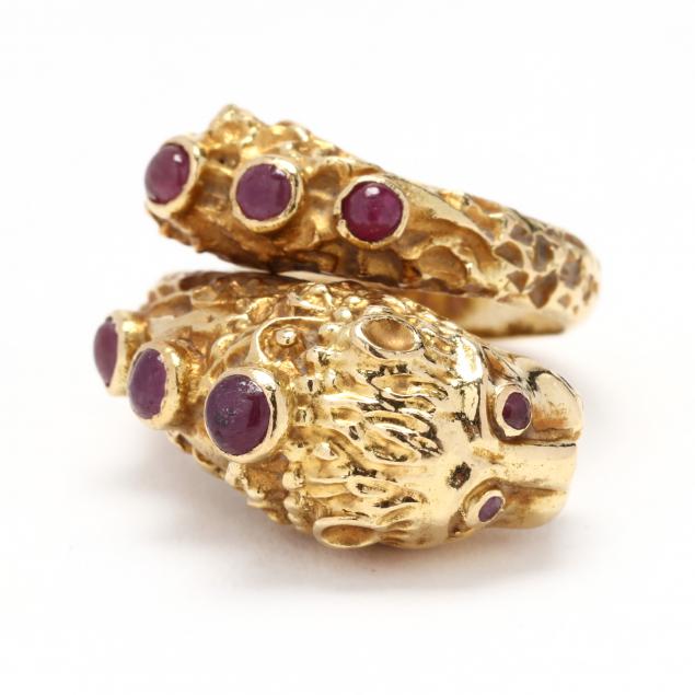 Appraisal: Gold and Gem-Set Lion Ring Designed in wrap-around lion motif