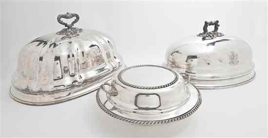 Appraisal: Two American Silverplate Cloches of shaped oval form surmounted with