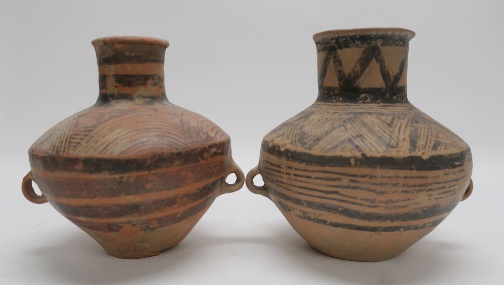 Appraisal: Two Chinese Neolithic Vases Two pottery jars with wide bodies