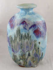 Appraisal: A Chinese ceramic vase of oval section rising to a