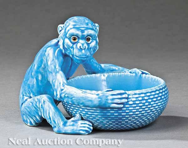 Appraisal: An Antique English Pottery Monkey with Bowl th c inset