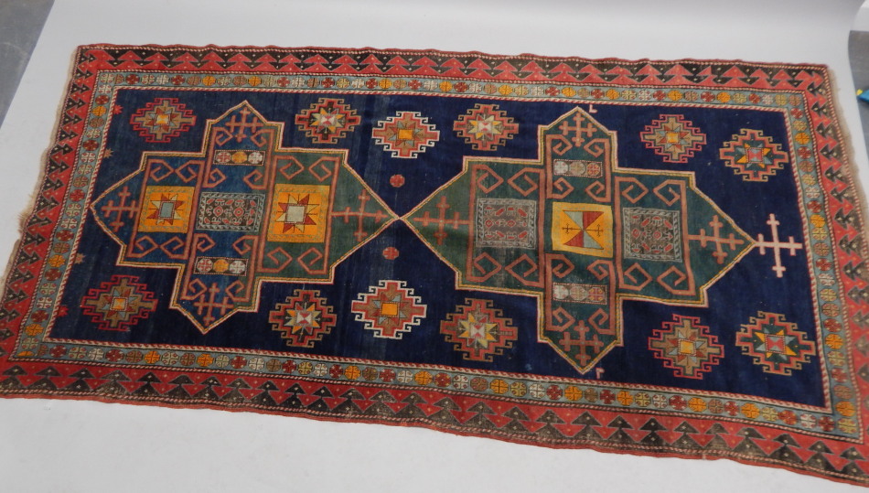 Appraisal: A Kazak type broad runner with a central geometric pole