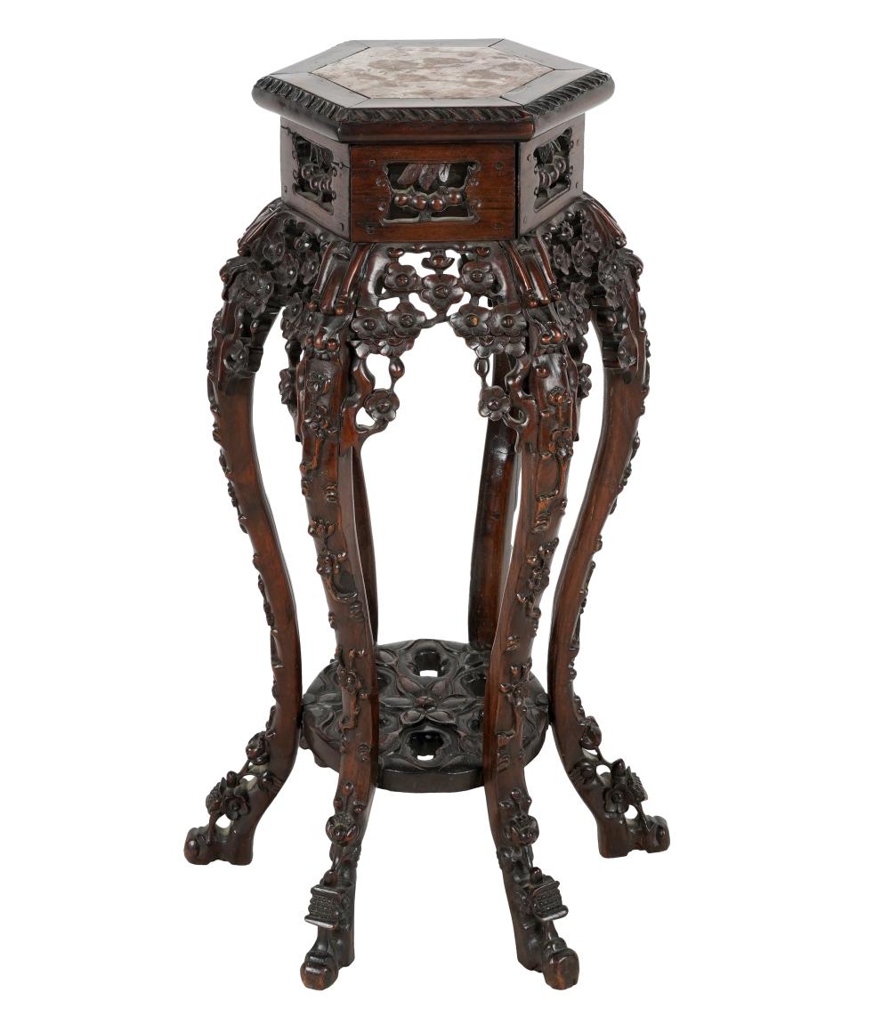 Appraisal: CHINESE CARVED WOOD FERN STANDwith hexagonal marble-inset top Provenance The