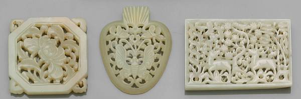 Appraisal: Three jade plaques The first a reticulated square shaped plaque