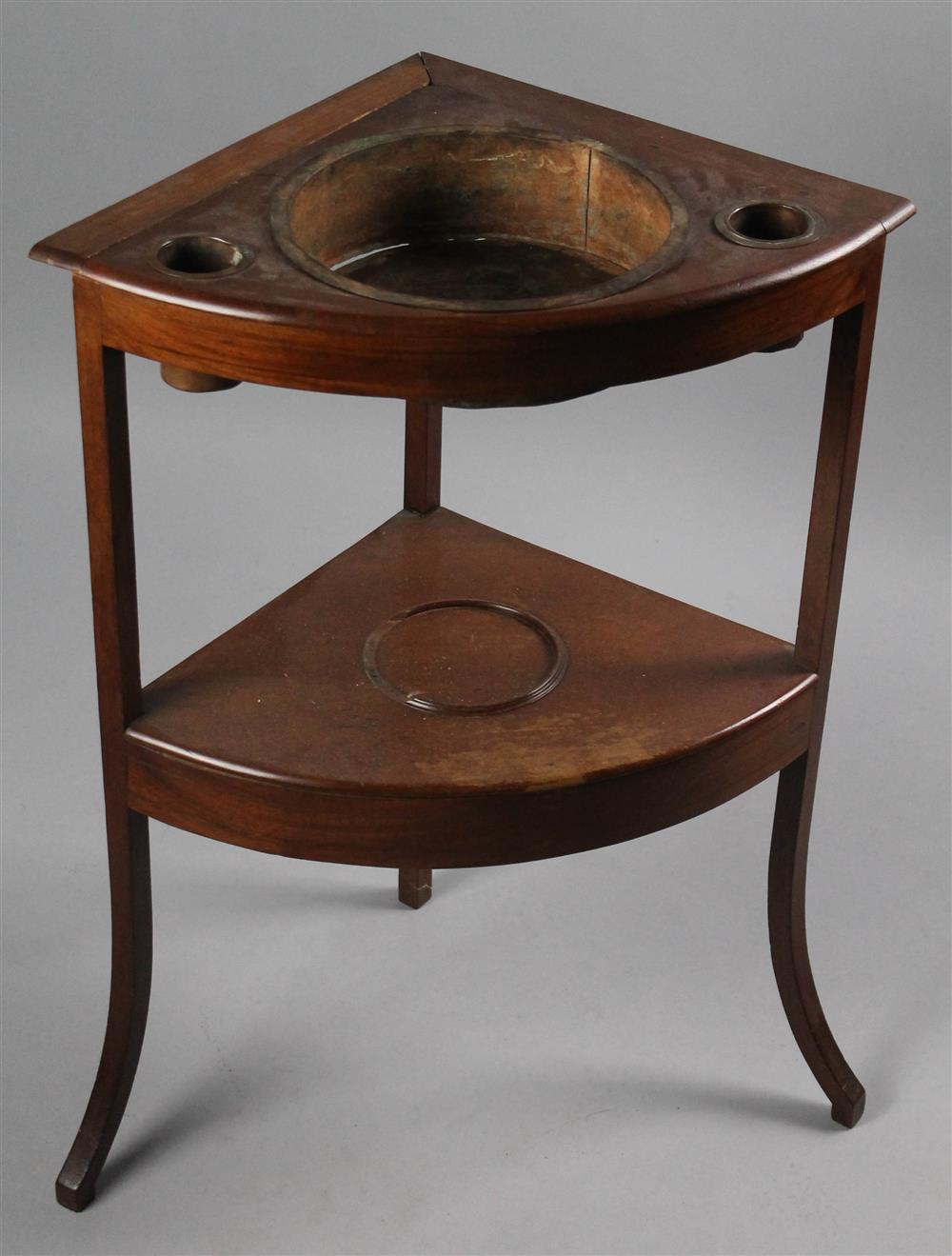 Appraisal: ENGLISH BOWED MAHOGANY CORNER WASHSTAND WITH COPPER INSERTS the two