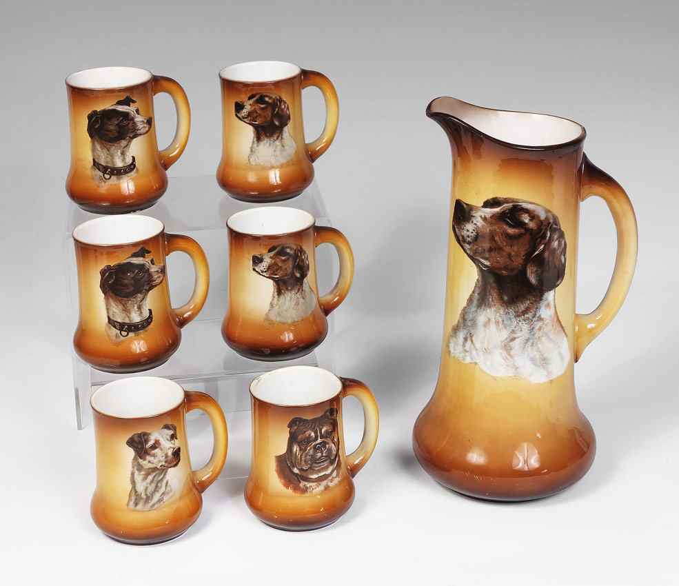 Appraisal: TRANSFERWARE DOG TANKARD SET Tankard and mugs featuring transferware images