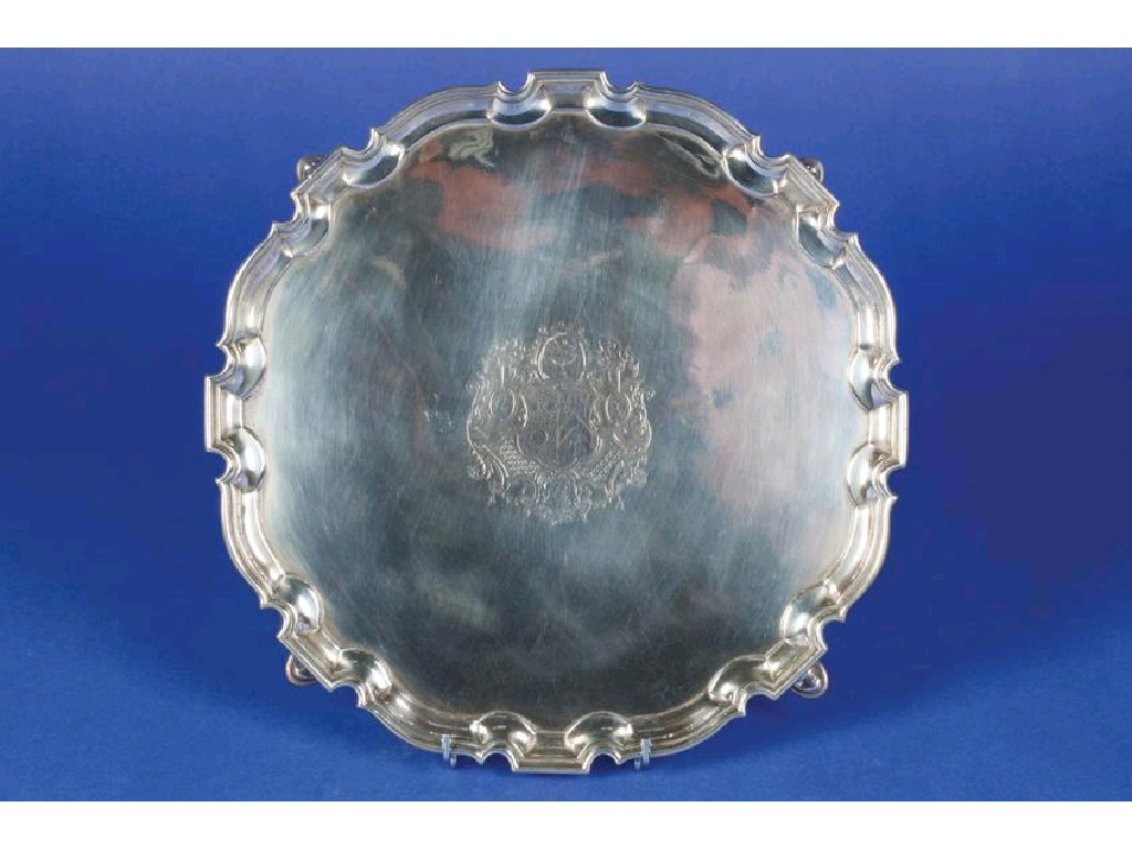 Appraisal: A GEORGE II SALVER of shaped circular form with a