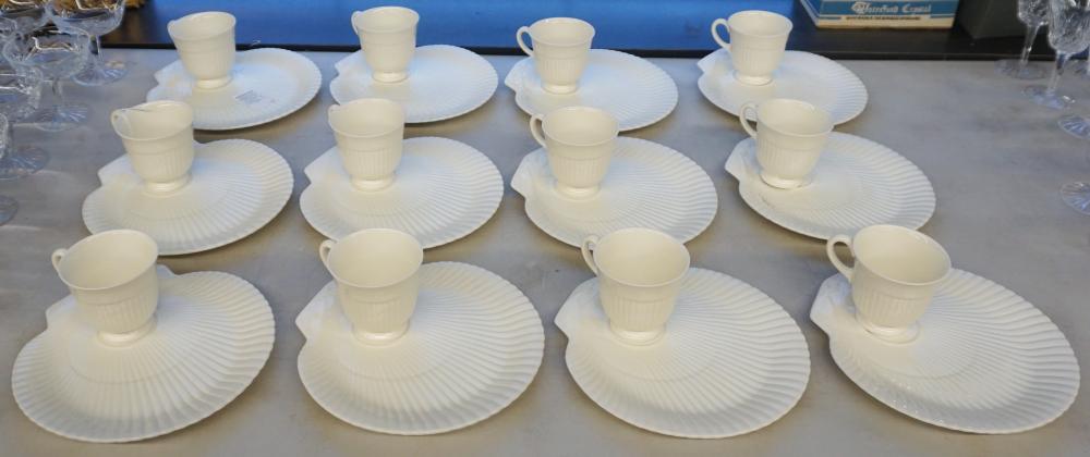 Appraisal: SET OF TWELVE WEDGWOOD PORCELAIN SHELL-FORM SNACK TRAYS WITH CUPSSet