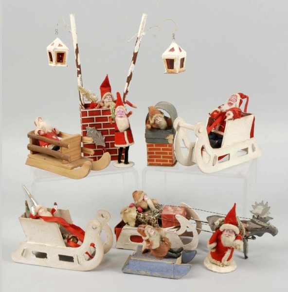 Appraisal: Lot of Santas Description Japanese Includes five in sleighs one