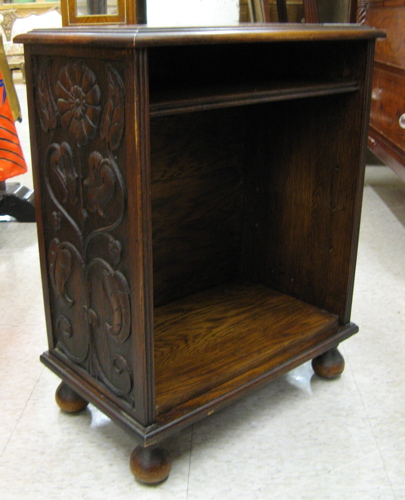 Appraisal: FEUDAL OAK TELEPHONE STAND AND COCKTAIL TABLE attributed to Jamestown