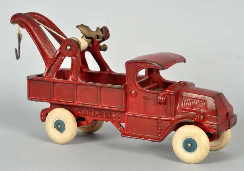 Appraisal: Cast Iron Champion Tow Truck Toy American White rubber tires