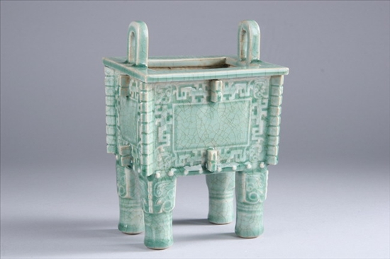 Appraisal: CHINESE CELADON PORCELAIN CENSER Imitating bronze-form fangding - With handles