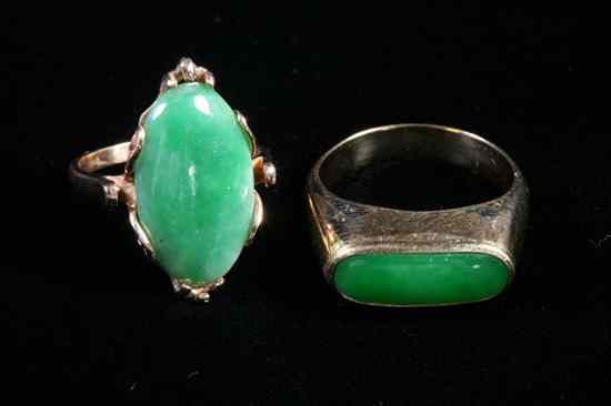 Appraisal: TWO K YELLOW GOLD AND JADEITE RINGS One oval cabochon