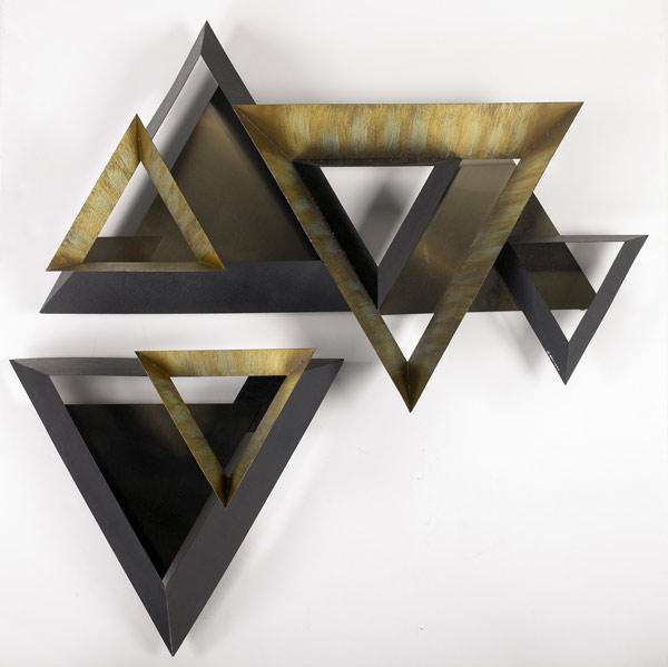 Appraisal: CURTIS JERE Two-piece geometric wall sculpture with enameled steel and