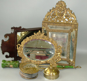 Appraisal: An Edwardian mahogany fret mirror together with a pressed bras