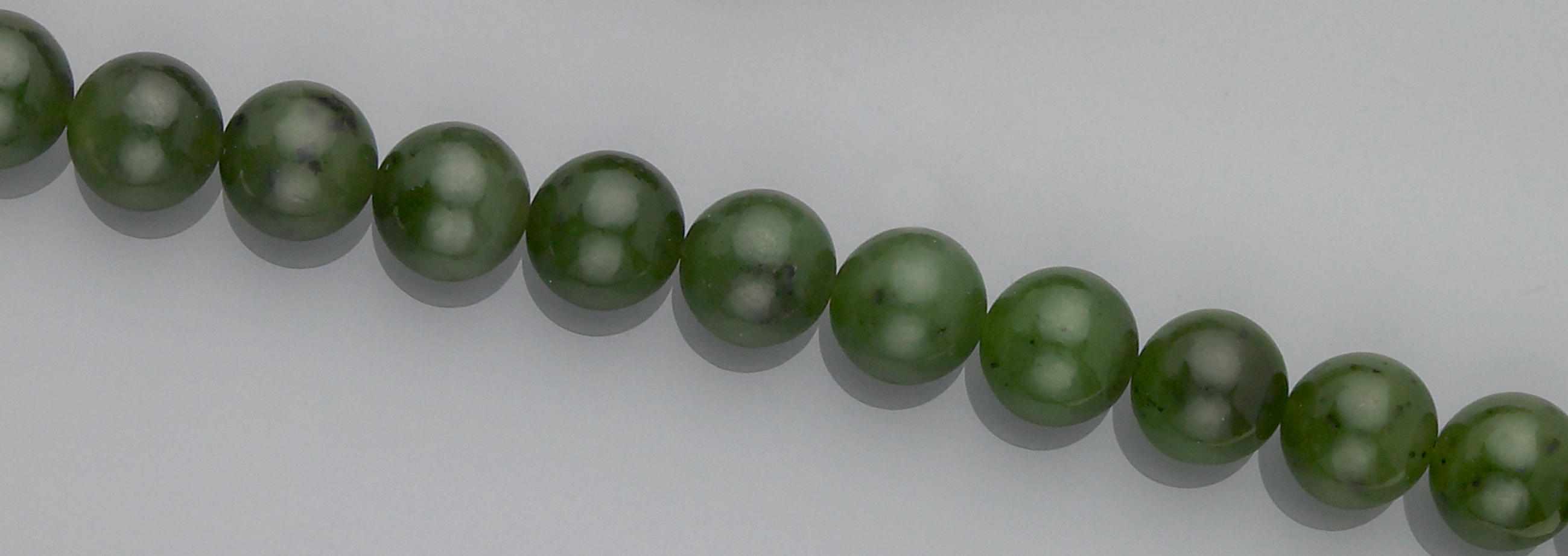 Appraisal: Nephrite Jade Bead Necklace British Columbia Canada A single strand