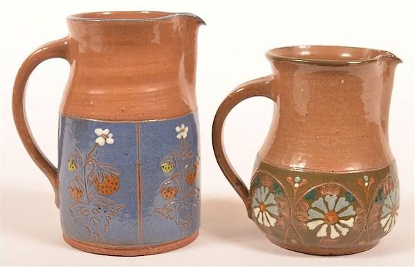 Appraisal: Two Hay Creek Pottery Floral Pitchers Two Hay Creek Pottery