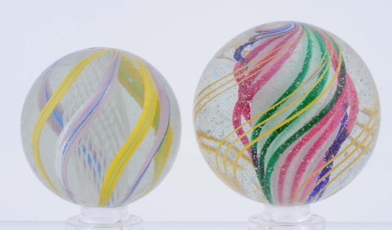 Appraisal: Lot Of Large Swirl Marbles The smaller has a white