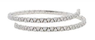 Appraisal: A WHITE GOLD DIAMOND SPIRAL BRACELET A WHITE GOLD DIAMOND