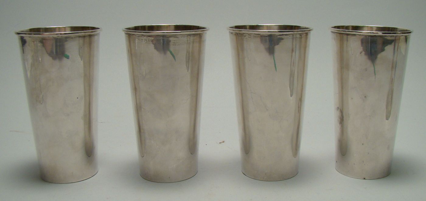 Appraisal: FOUR MEXICAN SILVER MINT JULEP CUPS Maker's mark for Plateria