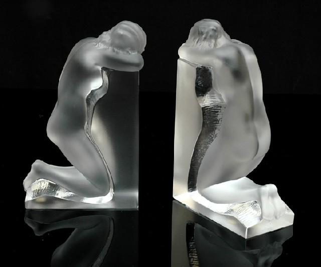 Appraisal: A PAIR OF CRYSTAL LALIQUE FIGURAL BOOKENDS Each modelled as