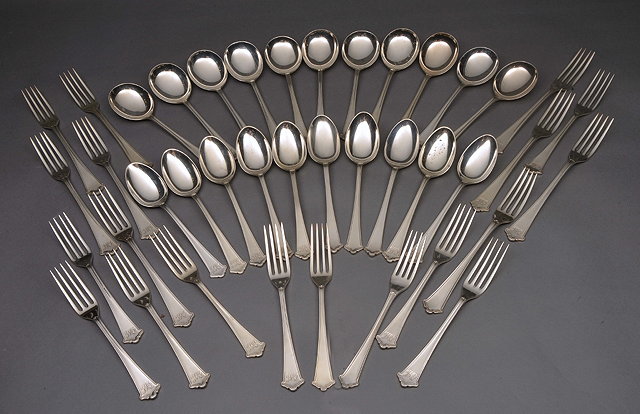 Appraisal: A COMPOSITE CANTEEN OF SILVER CUTLERY by Elkington Co circa