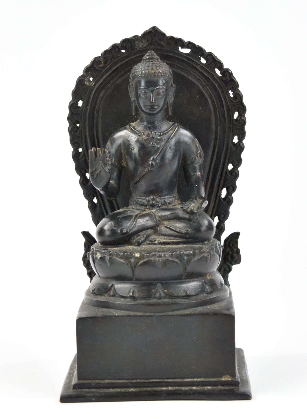 Appraisal: A bronze buddha cast seated in vajraparyankasana on a high