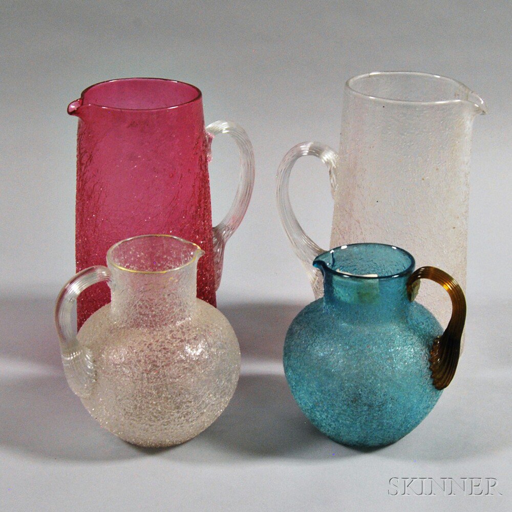 Appraisal: Four Overshot Glass Pitchers two tall cylindrical each with a