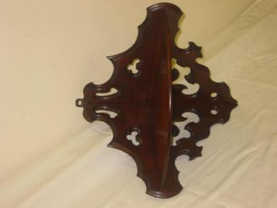 Appraisal: A PAIR OF VICTORIAN MAHOGANY BRACKET SHELVES of quadrant form