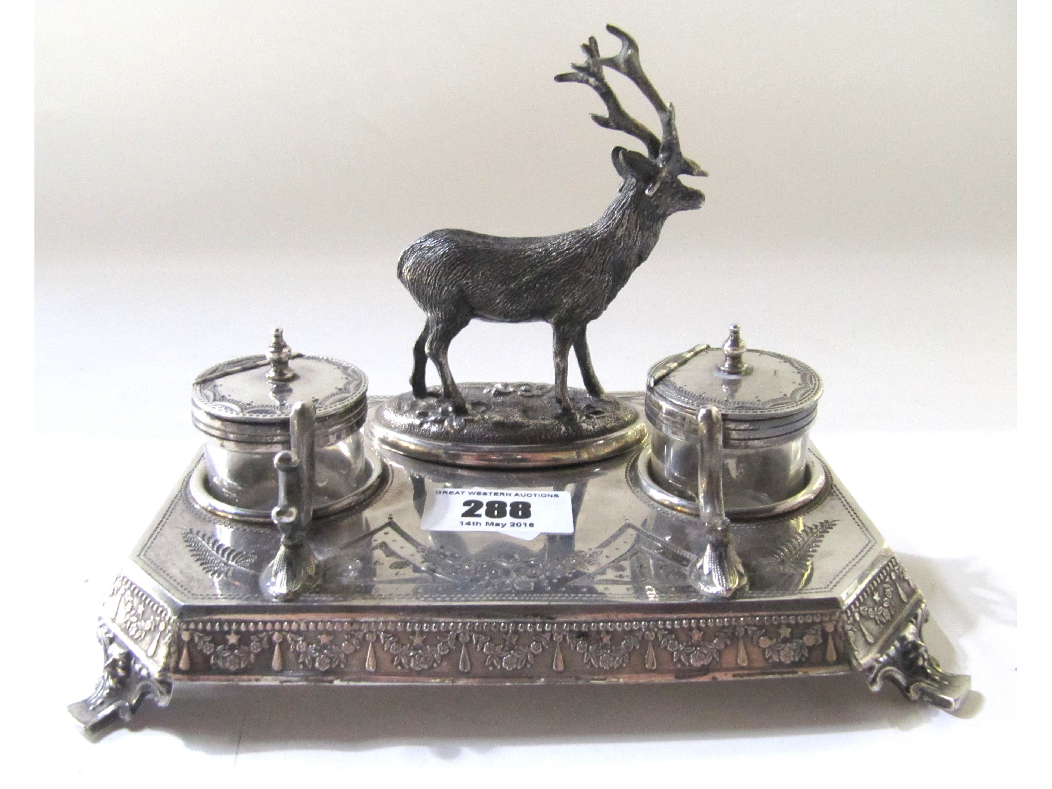 Appraisal: A silver plated double inkstand with stag surmount