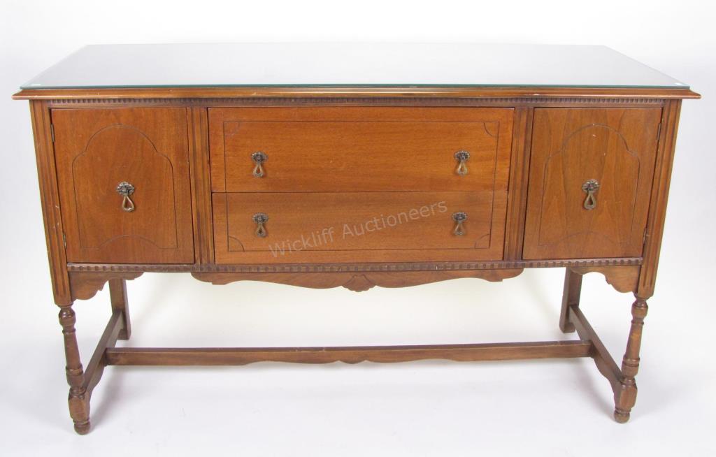 Appraisal: A Sheraton period-style sideboard walnut on carved legs with two