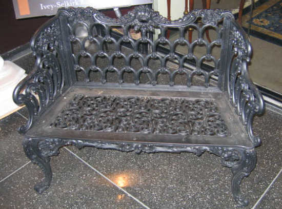 Appraisal: ROCOCO STYLE CAST IRON GARDEN BENCH The back of scrolling