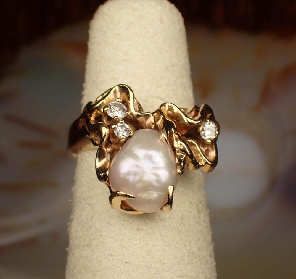 Appraisal: BAROQUE PEARL DIAMOND AND FOURTEEN KARAT GOLD RING The yellow