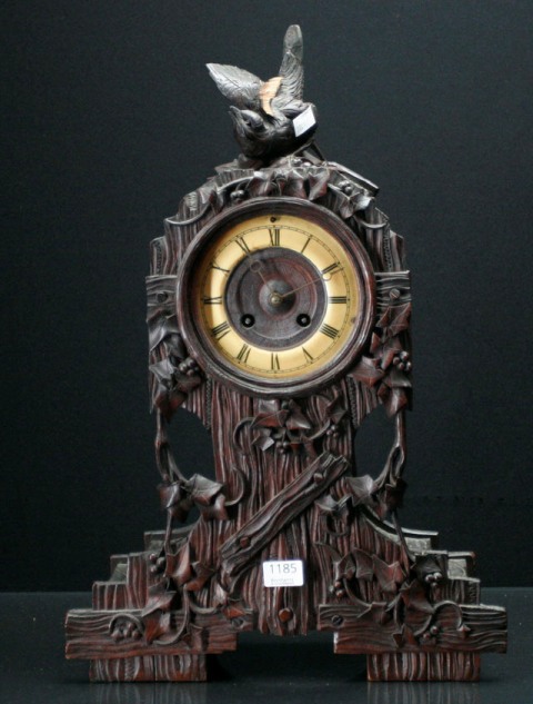 Appraisal: An early th century walnut bracket clock with carvings to