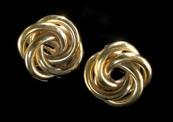 Appraisal: Pair of Retro Moderne Fourteen-Karat Yellow Gold Knot Earrings each