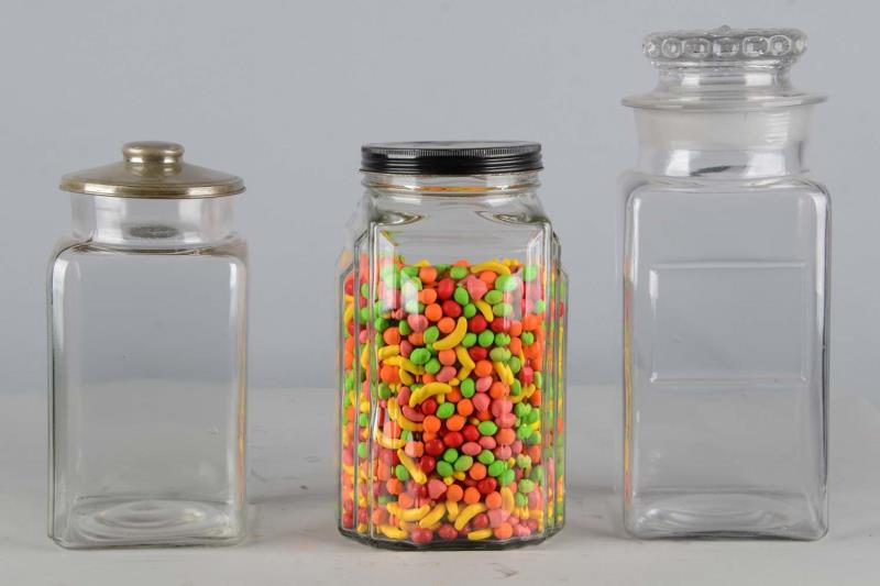 Appraisal: Lot Of Glass Countertop Candy Display Jars All jars have