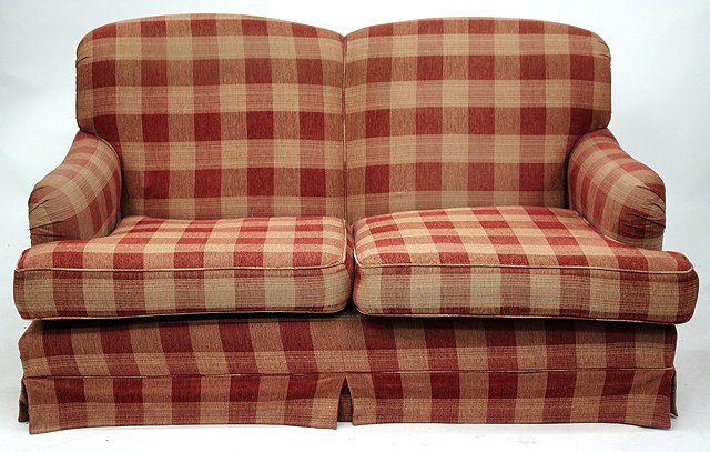 Appraisal: A MODERN HOWARD STYLE TWO SEATER SOFA with red checked