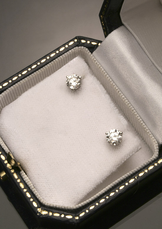 Appraisal: Pair of Platinum and Diamond Ear Studs Each three-prong A-box