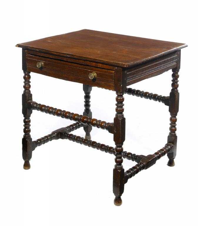 Appraisal: A WILLIAM III OAK SIDE TABLE the frieze with moulded