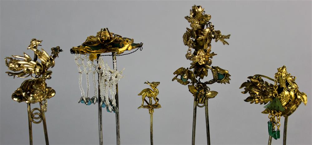 Appraisal: FIVE CHINESE GILT HAIR PINS each surmounted with finely executed