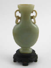 Appraisal: A Chinese th c jade vase with ring handles approx