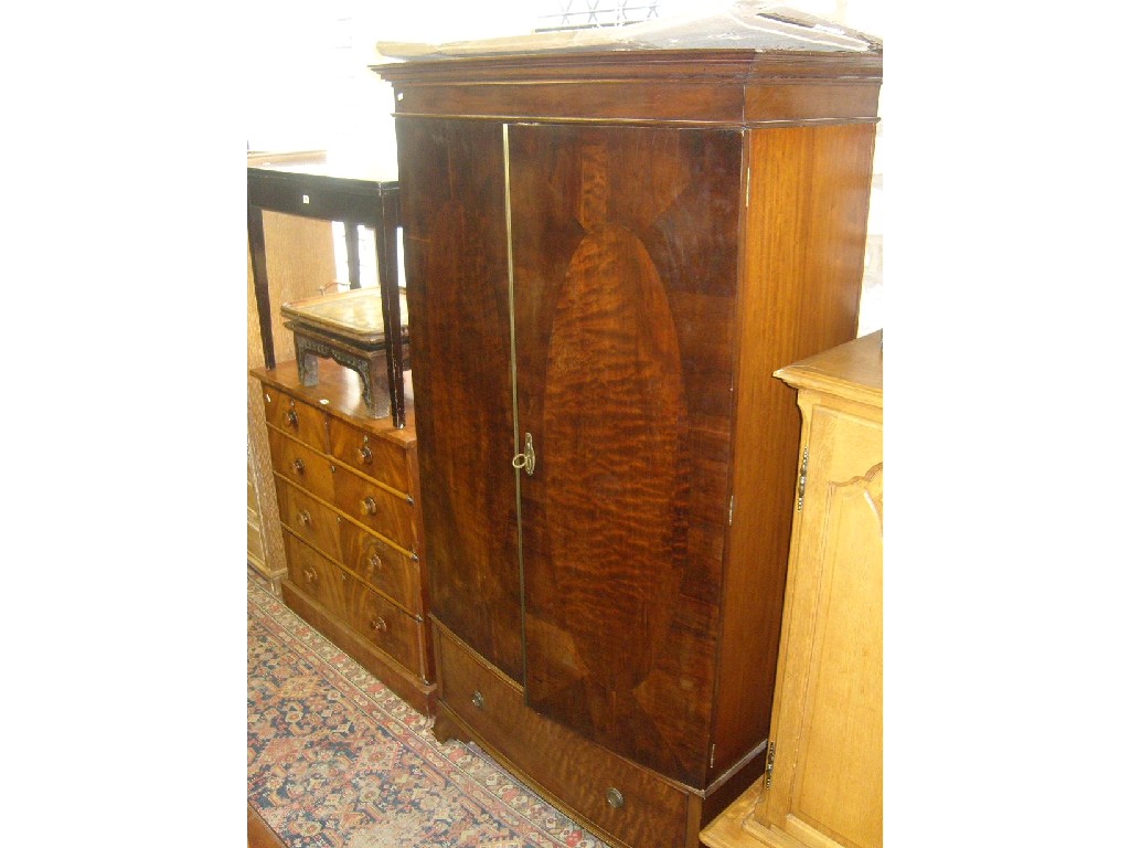 Appraisal: A good quality Edwardian walnut bow fronted wardrobe in the