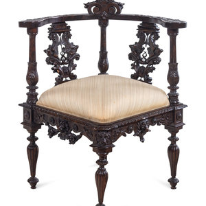 Appraisal: A Renaissance Revival Carved Walnut Corner Chair Late th Century