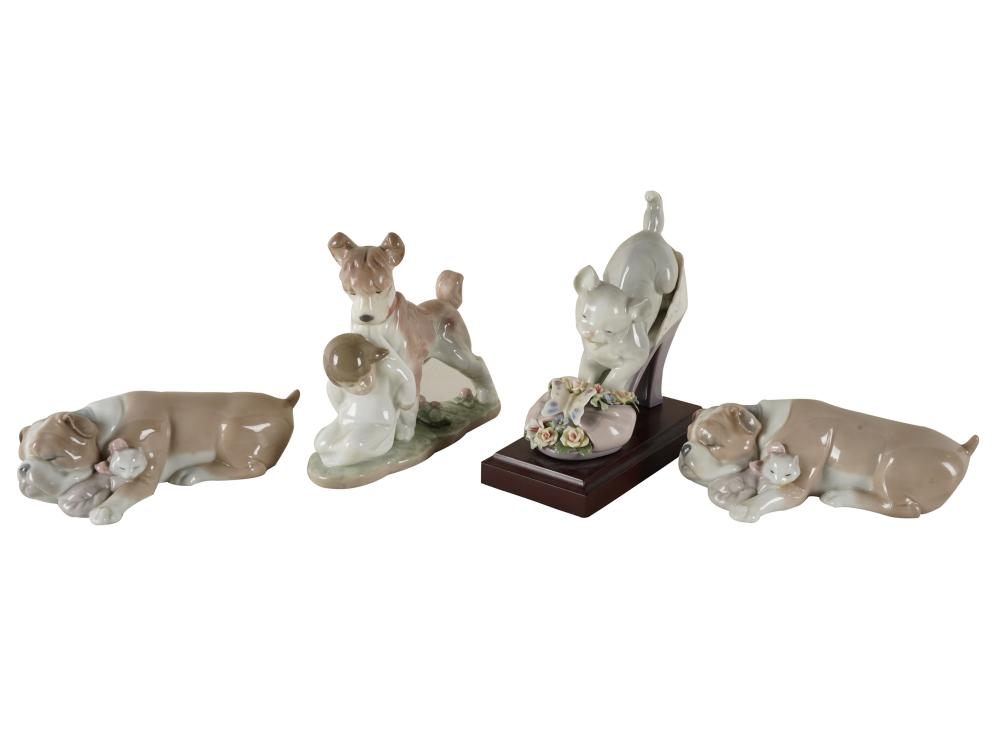 Appraisal: FOUR LLADRO PORCELAIN ANIMAL FIGURESeach signed comprising three dog groups