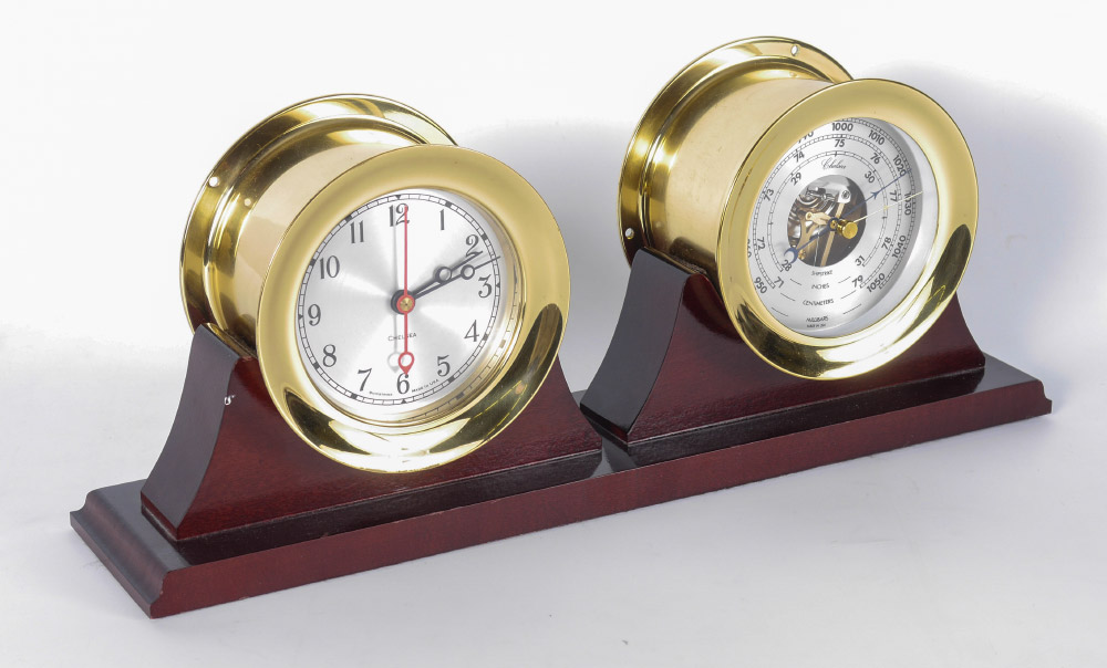 Appraisal: CHELSEA SHIPS CLOCK BAROMETER Round brass cases to both shipstrike