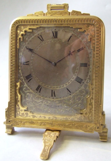 Appraisal: A gilt brass cased travelling timepiece by Thomas Cole London